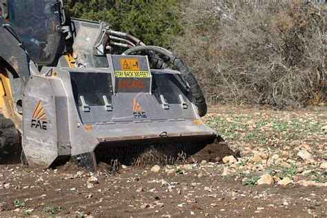 skid steer rock milling attachment|skid steer stone crushing attachments.